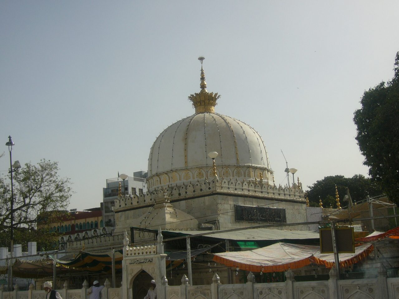The white marble dome of the Dargah with its golden crown