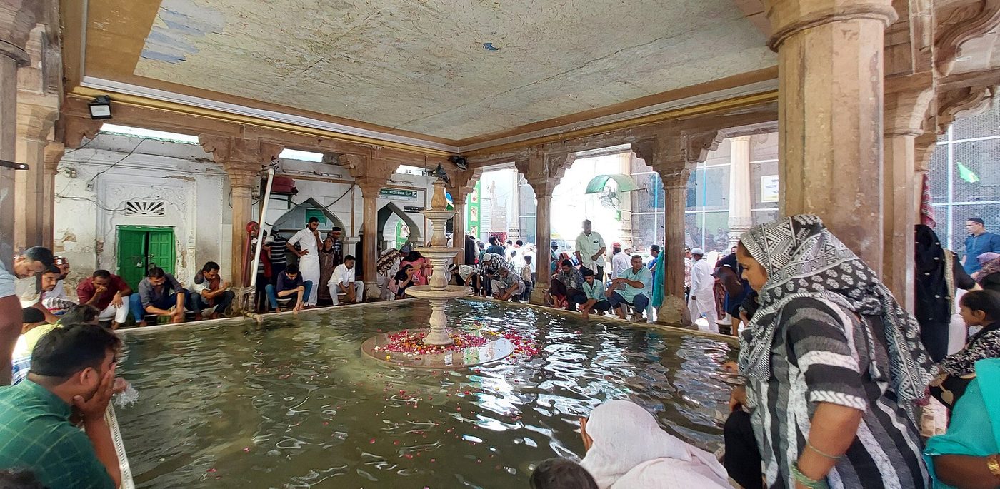 Water tank beneath an arched pavilion